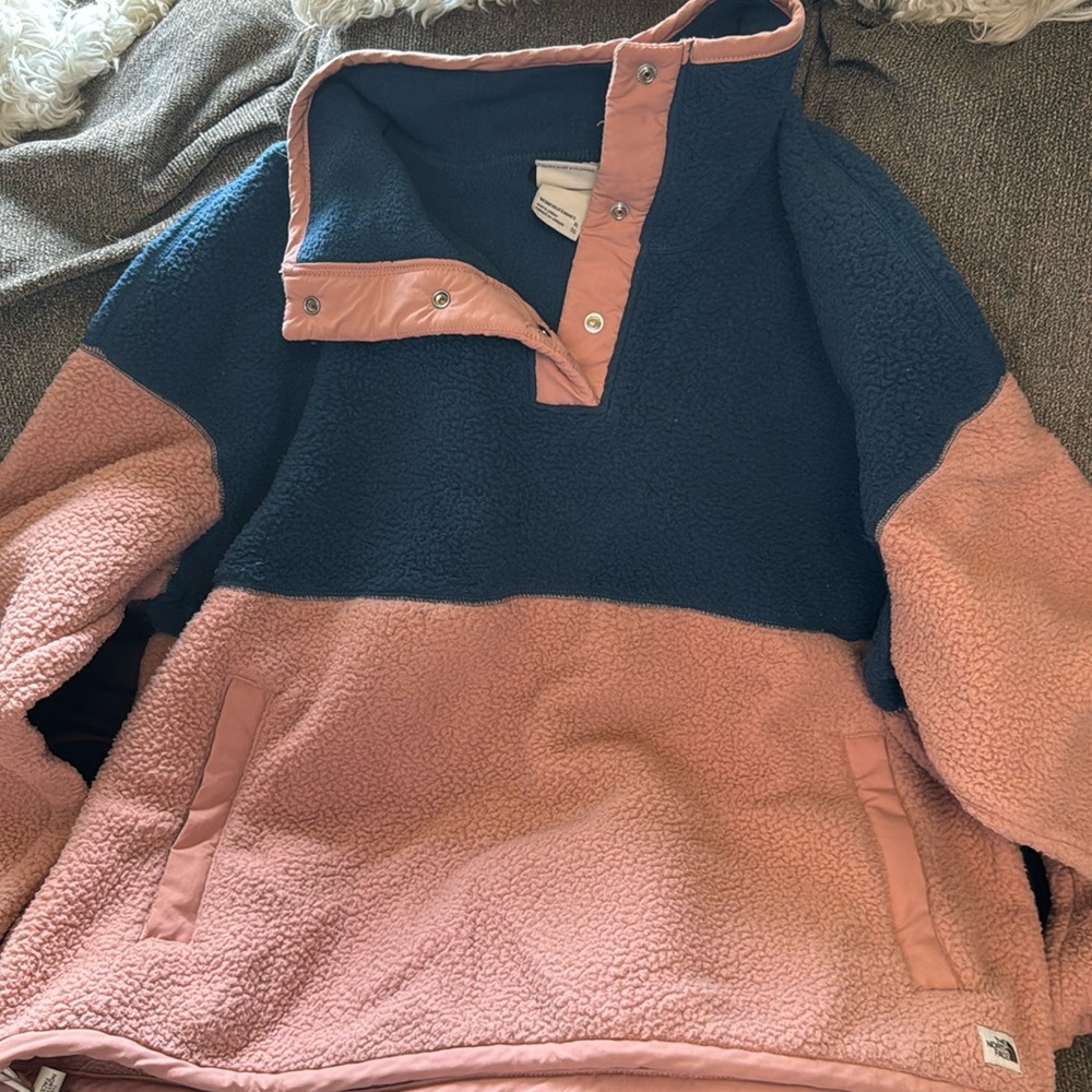Women’s Northface fleece pink and blue.